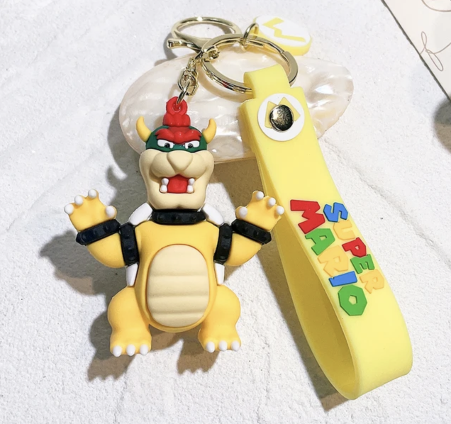 Charakter-Schlüsselanhänger Mario, Luigi, Peach...